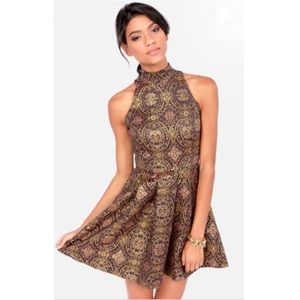 BB Dakota fit and flare dress purple and gold